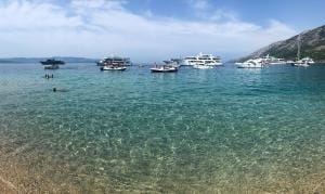 Clear waters on Zlatni Rat/Golden Horn beach in Bol, Brač
